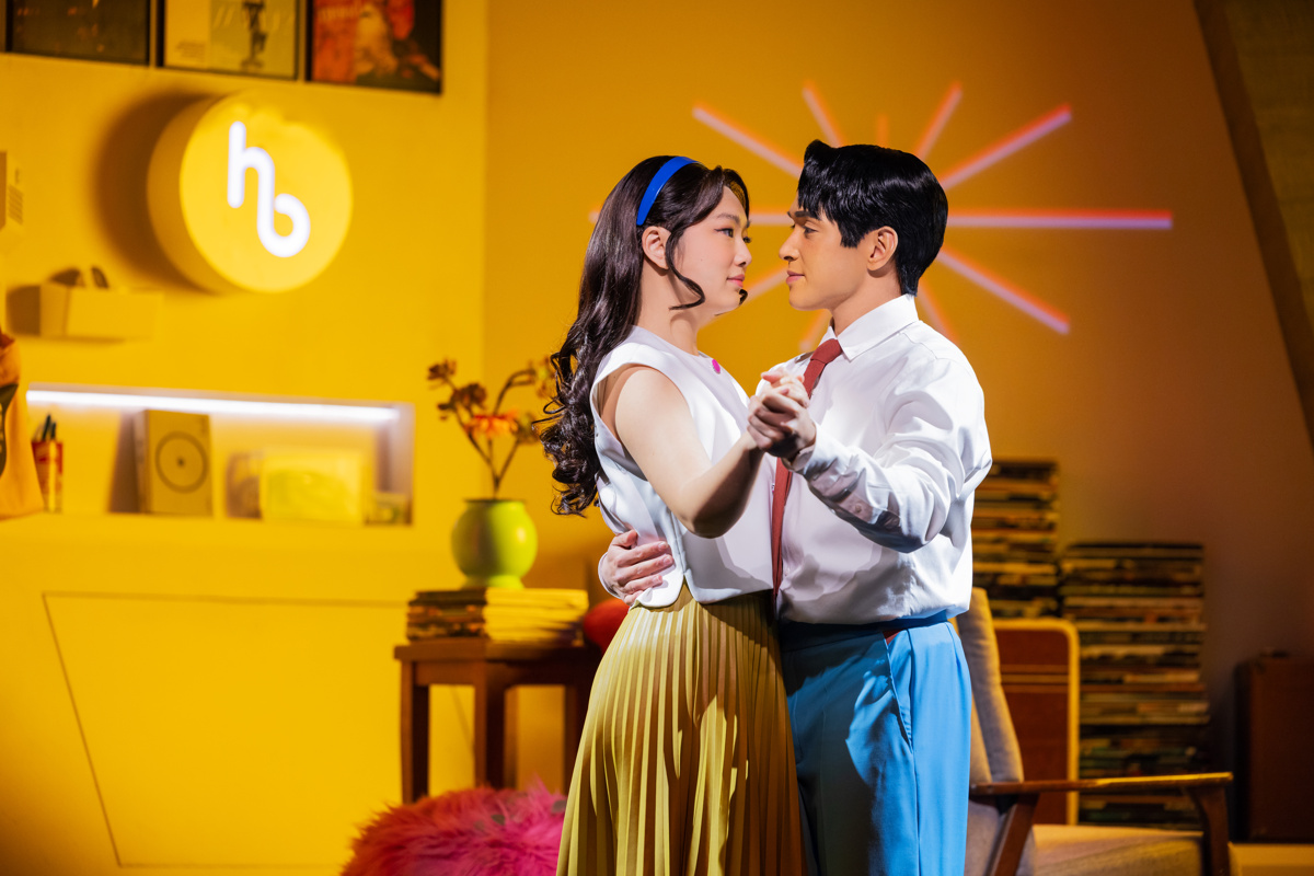 Zachary Noah Piser as Helperbot Oliver and Hannah Kevitt as Helperbot Claire in Maybe Happy Ending on Broadway