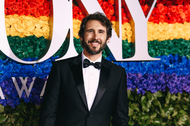 Presenter Josh Groban flashes a smile.