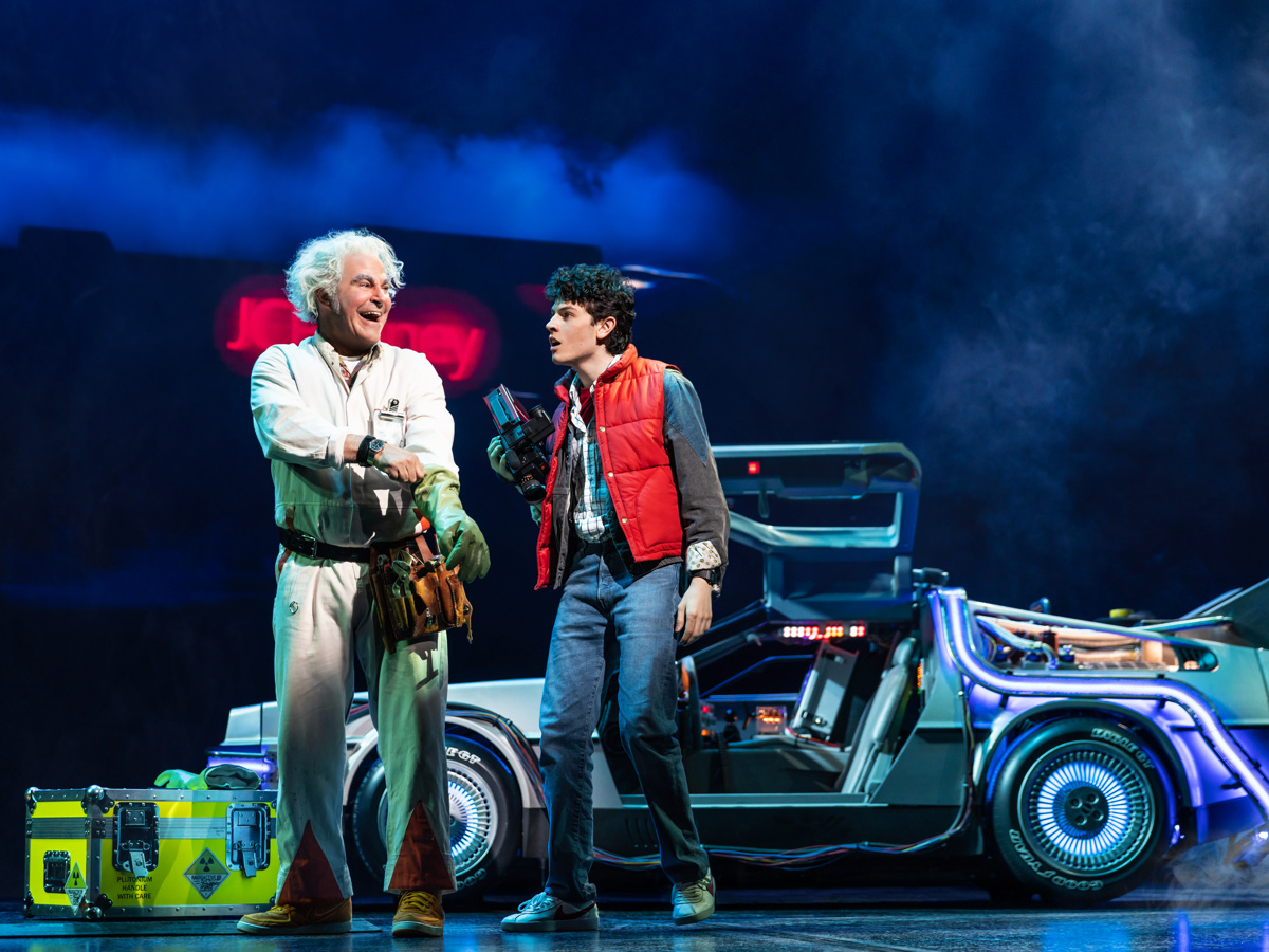 Roger Bart as Doc Brown and Casey Likes as Marty McFly in Back to the Future