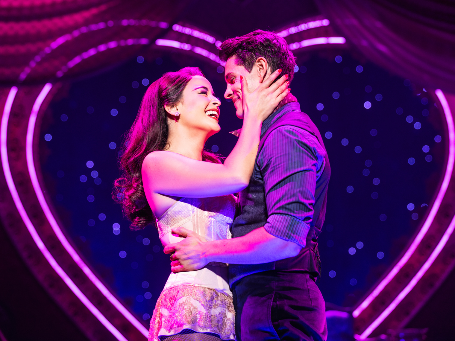 Courtney Reed as Satine and Casey Cott as Christian in <i>Moulin Rouge! The Musical</i>.