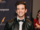 The evening’s host Michael Urie is all smiles.