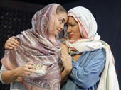 Shazi Raja as Basminder “Boz” Batra  and Purva Bedi as Deepa Batra in India Pale Ale.