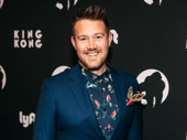 King Kong songwriter Eddie Perfect is all smiles.