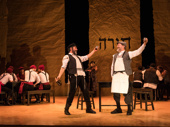 Steven Skybell as Tevye, Bruce Sabath as Leyzer-Volf and the cast of Fiddler on the Roof.