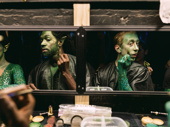 Cast members Ramone Owens and Ryan Breslin greenify themselves to perform "That Beautiful Sound."
