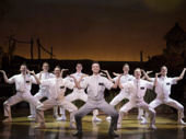 Stephen Ashfield as Elder McKinley and the cast of The Book of Mormon.