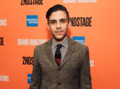 Playwright Matthew Lopez poses on the red carpet. His play The Inheritance is currently running.