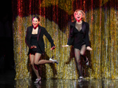 Bianca Marroquín as Velma and Charlotte d'Amboise as Roxie in Chicago.