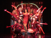Callum Francis as Lola and the cast of Kinky Boots.