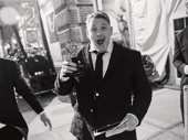 A surprised Michael Arden shows off his Tony for his direction of Parade.