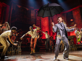 Jon Jon Briones as Hermes and the cast of Hadestown.