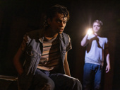 Sky Lakota-Lynch as Johnny Cade and Trevor Wayne as Ponyboy Curtis in The Ousiders.