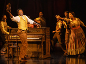 Joshua Henry as Coalhouse Walker Jr. and the cast of Ragtime.