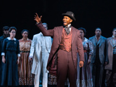 John Clay III as Booker T. Washington and the cast of Ragtime.