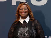 Actress Retta looks glamorous on the opening night carpet of Proof on Broadway.