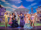 Ana Gasteyer as Mildred Layton and the cast of Schmigadoon!.