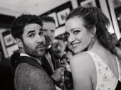 2025 Tony winner Darren Criss and wife Mia Swier, caught mid-discussion about Criss' avoidance of aerial gymnastics.
