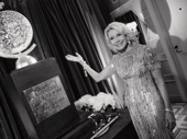 Schmigadoon! producer Christine Schwarzman takes the cake. (Yes, she did win a Tony and yes, that is a cake.)