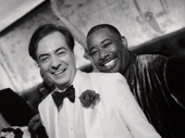 Host John Gore smiles wide with Joe Turner's Come and Gone producer Brian Moreland.