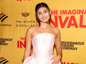 Ava Lalezarzadeh takes a pink note from her character, lovestruck daughter Angelique, in The Imaginary Invalid on Broadway.