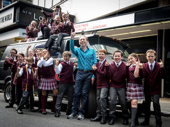 It's time to play in the U.K.! School of Rock's music mastermind Andrew Lloyd Webber strikes a pose with the London production's spectacular kid cast. Performances begin on October 24 with opening night scheduled for November 14.(Photo: Twitter.com/OfficialALW)