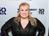 Rebel Wilson flashes a pitch-perfect smile.