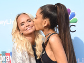 Awww! Hairspray: Live!'s Kristin Chenoweth and Ariana Grande share a smooch.(Photo: Chris Delmas/AFP/Getty Images)