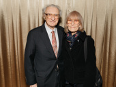 Tony-winning lyricist Sheldon Harnick snaps a photo with his wife, Margery Gray.