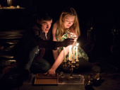 Madison Ferris as Laura Wingfield and Finn Wittrock as Jim O'Connor in The Glass Menagerie. 