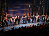 The cast is greeted by their Newfoundlander counterparts on stage.