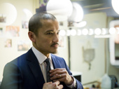 Big shot! Jon Jon Briones suits up for the opening night party.