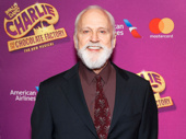 Charlie and the Chocolate Factory’s John Rubinstein takes a photo.