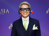 Broadway legend Tommy Tune flashes a smile.