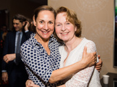 Acting titans Laurie Metcalf and Kate Burton hug it out.