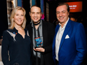 The John Gore Organization's Chief Operating Officer Lauren Reid and CEO and Chairman John Gore celebrate Jujamcyn President Jordan Roth's BACA Best Revival win for Falsettos.