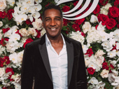 Tony nominee Norm Lewis takes a photo.