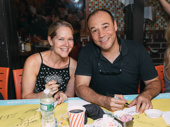 The couple that autographs together! Theater couple Rebecca Luker and Danny Burstein take a photo.