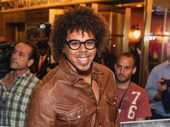 E Street band saxophonist Jake Clemons, the son of legendary sax player Clarence Clemons, takes a photo.