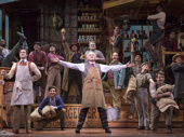 Victor Garber as Horace Vandergelder and the cast of Hello, Dolly!. 